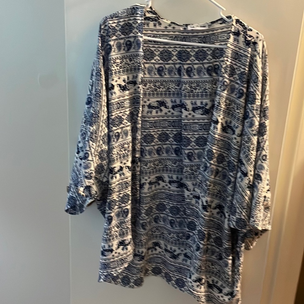 Adorable blue and white kimono top.